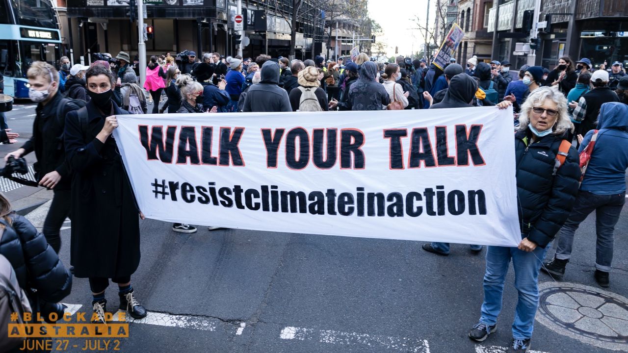 Climate activists from Blockade Australia blocked traffic during peak hour in Sydney Monday morning, June 27. 