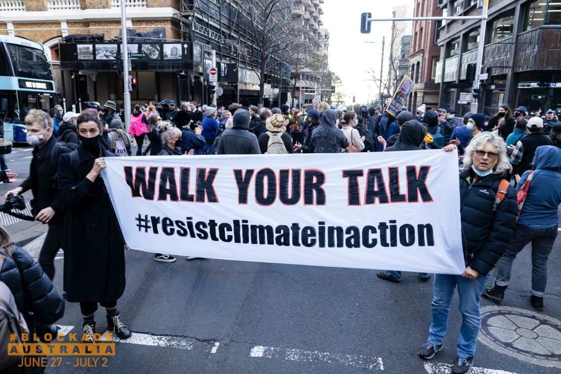 Climate activists from Blockade Australia blocked traffic during peak hour in Sydney Monday morning, June 27.
