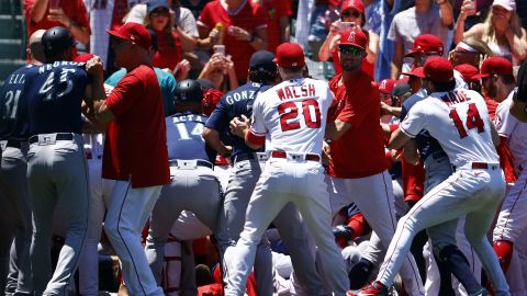 The Seattle Mariners and the Los Angeles Angels clear the benches after Jesse Winker charged the Angels dugout after being hit by a pitch in the second inning.
