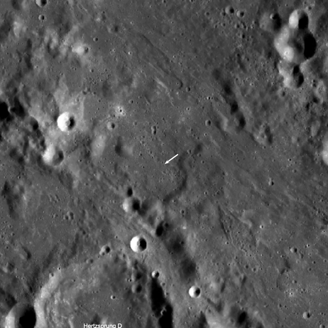 The new crater is smaller than others and not visible in this view, but its location is indicated by the white arrow. 