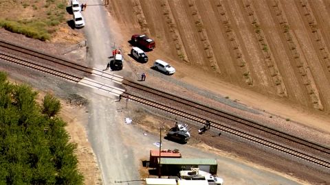 First responders work at the scene of the crash in a rural part of California.