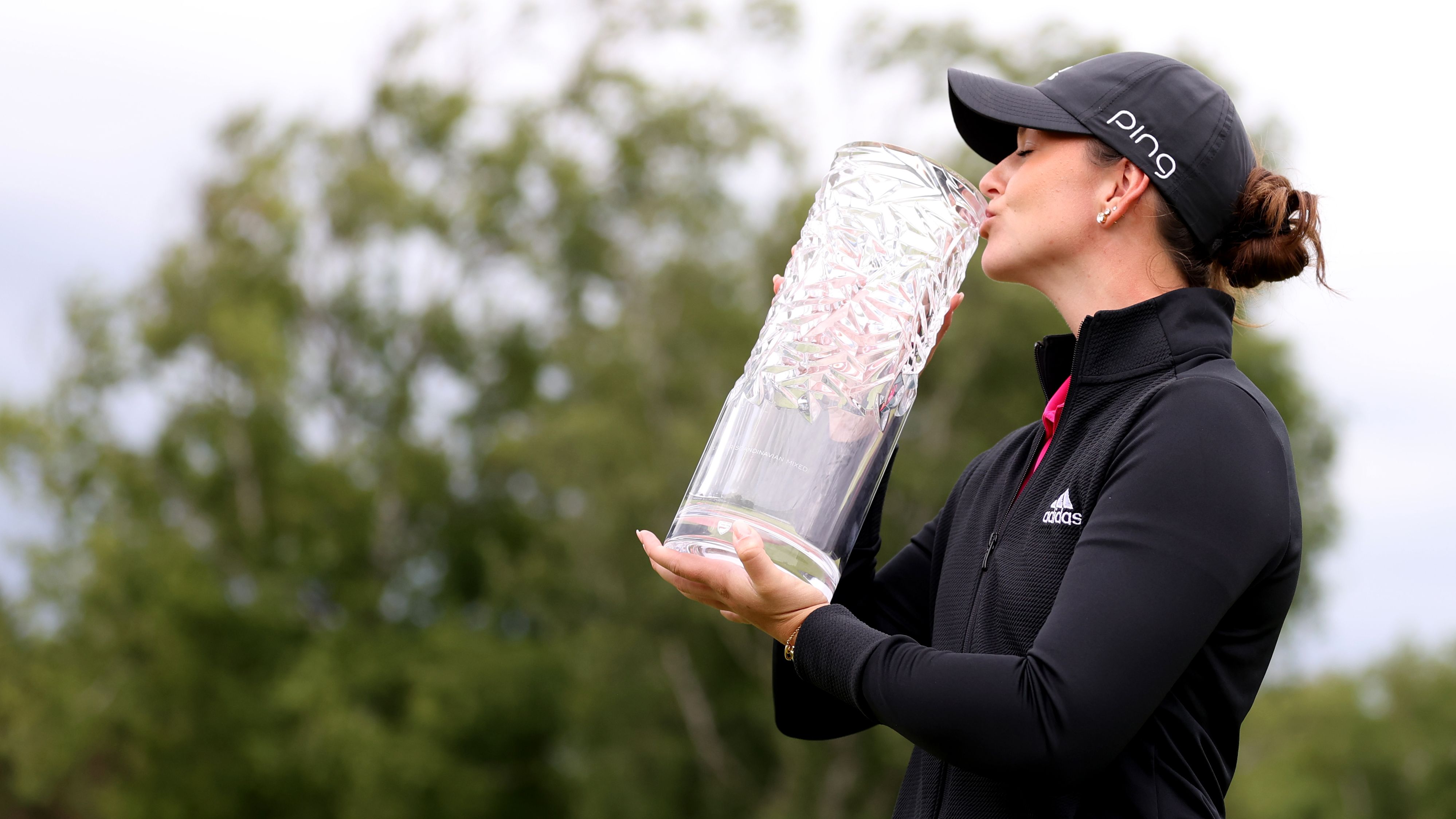 Linn Grant poses with the trophy after winning the Scandinavian Mixed, in Halmstad, Sweden, on June 12, 2022.