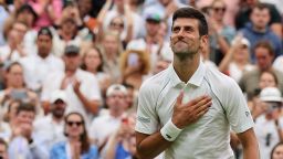 Serbia's Novak Djokovic celebrates beating South Korea's Kwon Soon-woo after their men's singles tennis match on the first day of the 2022 Wimbledon Championships at The All England Tennis Club in Wimbledon, southwest London, on June 27, 2022. - RESTRICTED TO EDITORIAL USE (Photo by Adrian DENNIS / AFP) / RESTRICTED TO EDITORIAL USE (Photo by ADRIAN DENNIS/AFP via Getty Images)