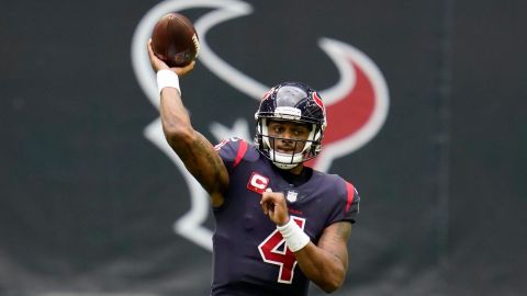 Deshaun Watson, seen here playing for the Houston Texans in 2020, faces a possible suspension from the NFL pending the league's investigation 