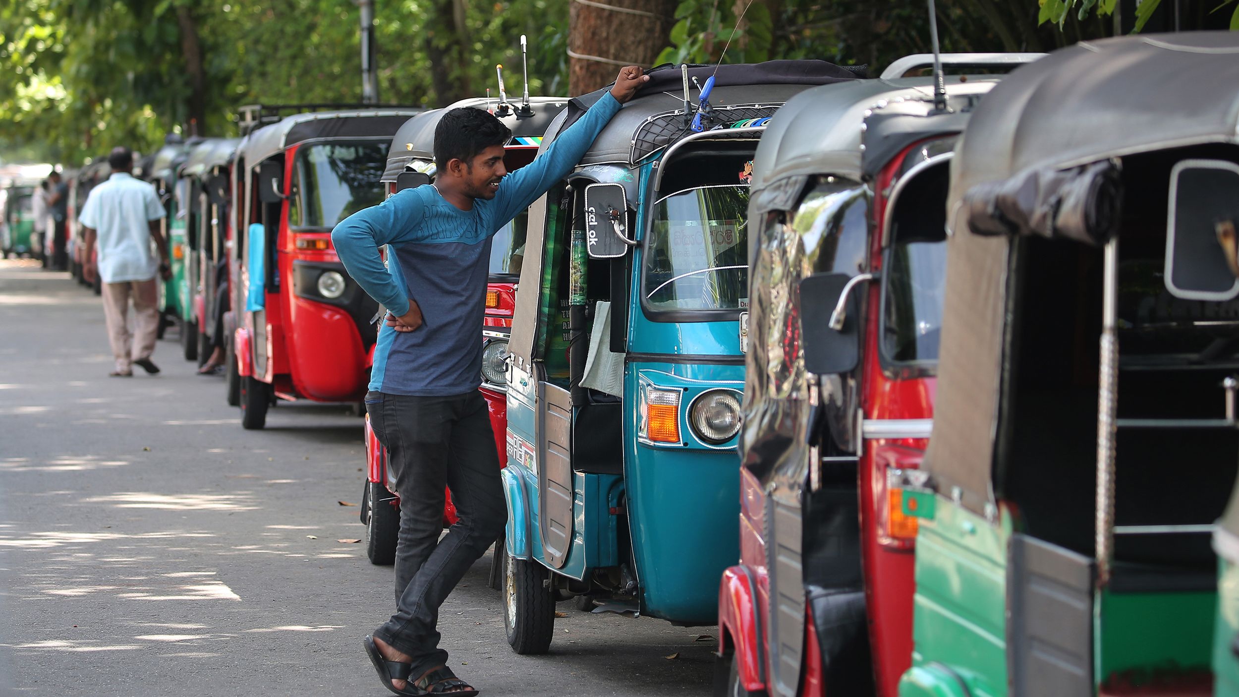 A man in a queue expecting to buy fuel in Colombo on June 27.