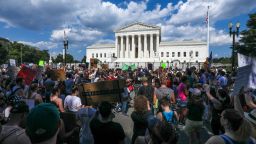 Demonstrators rally in front of the US Supreme Court in Washington, DC, on June 25, 2022, a day after the Supreme Court struck down the right to abortion. 