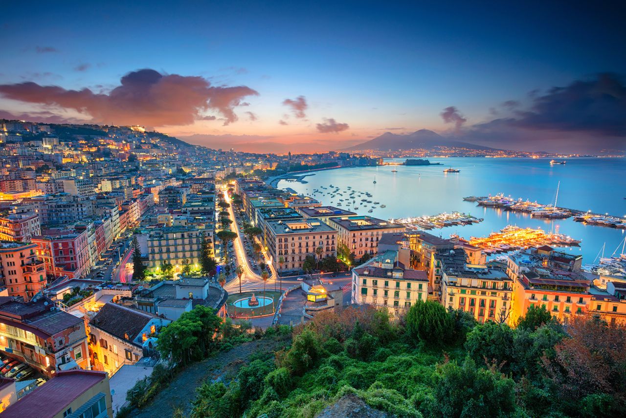 An aerial shot of Naples during sunrise.