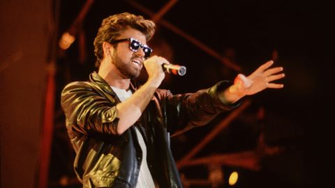 George Michael performs at Live Aid at Wembley Stadium in London on July 13, 1985.  