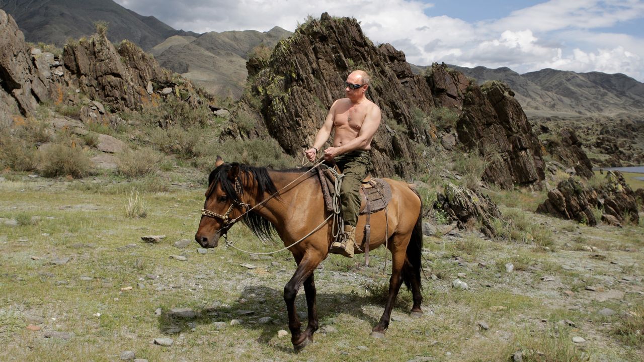 Russian Prime Minister Vladimir Putin rides a horse during his vacation in Siberia, 2009. 