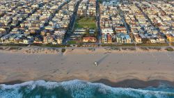 In an aerial view, Bruce's Beach (C) is wedged between expensive real estate on April 19, 2021 in Manhattan Beach, California. The beachfront property was once a seaside resort owned by Charles and Willa Bruce, a Black couple, which catered to African Americans. Amid the Jim Crow era, the city claimed the property in 1924 through eminent domain while vastly underpaying the couple for the land. Los Angeles County is making plans to return the prime beachfront property, which may be worth $75 million, to Bruce family descendants. 