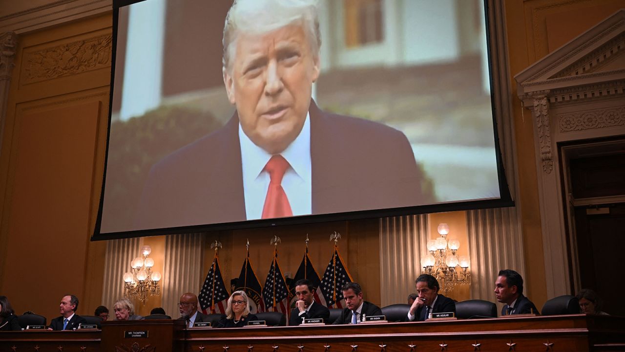 Video of Trump is displayed on a screen during the hearing on June 28.