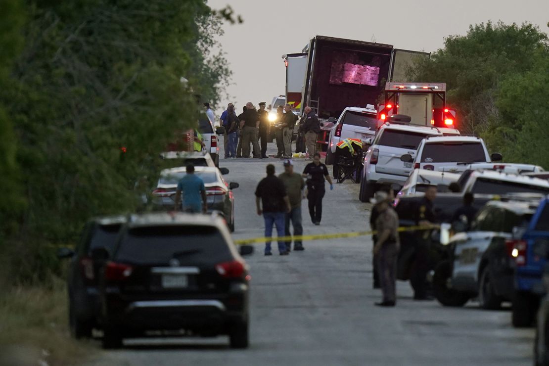 Police and other first responders work the scene where officials say dozens of people were found dead Monday in San Antonio. 