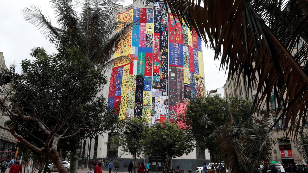 The Truth Commission building in Bogota is covered by 540 meters of cloth, woven by men and women belonging to the Seamstresses of Memory.