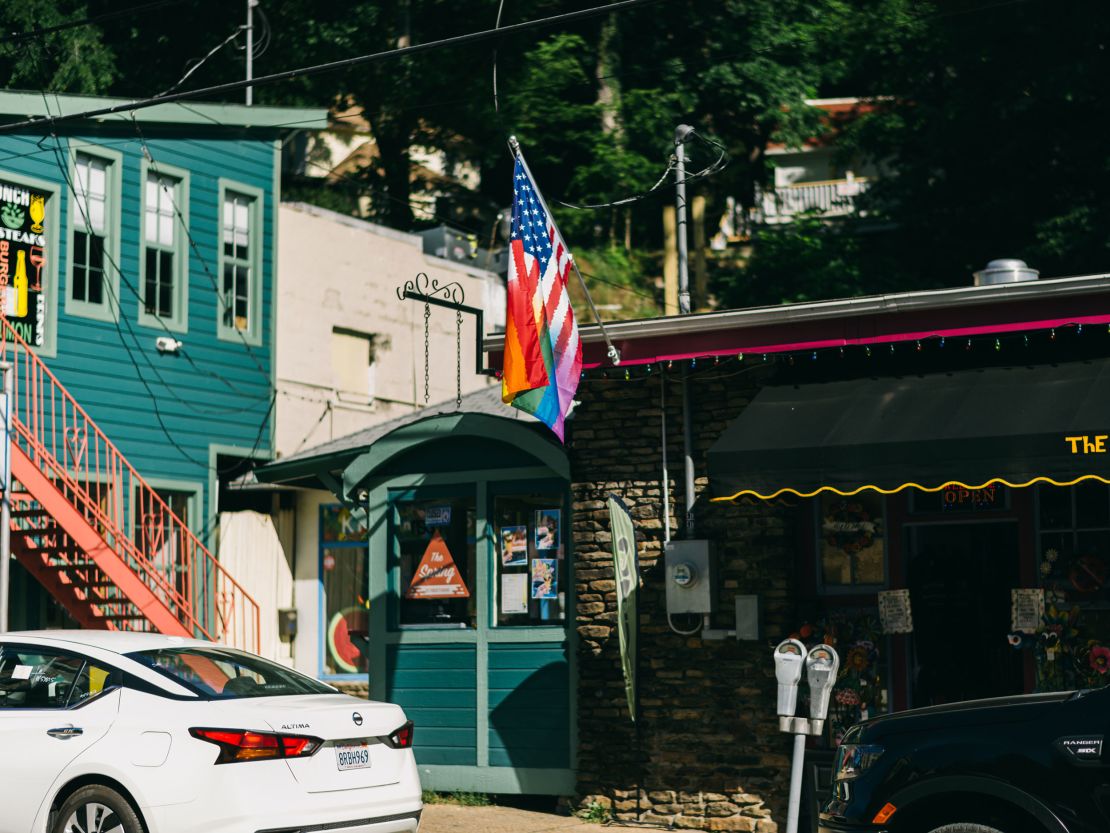 A flag rises above a storefront in downtown Eureka Springs on June 21.