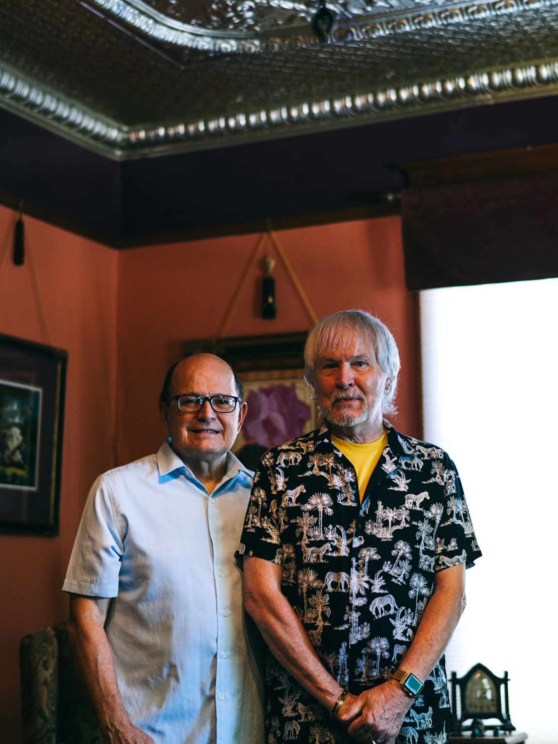 Zeek Taylor and his husband Dick Titus at their home.