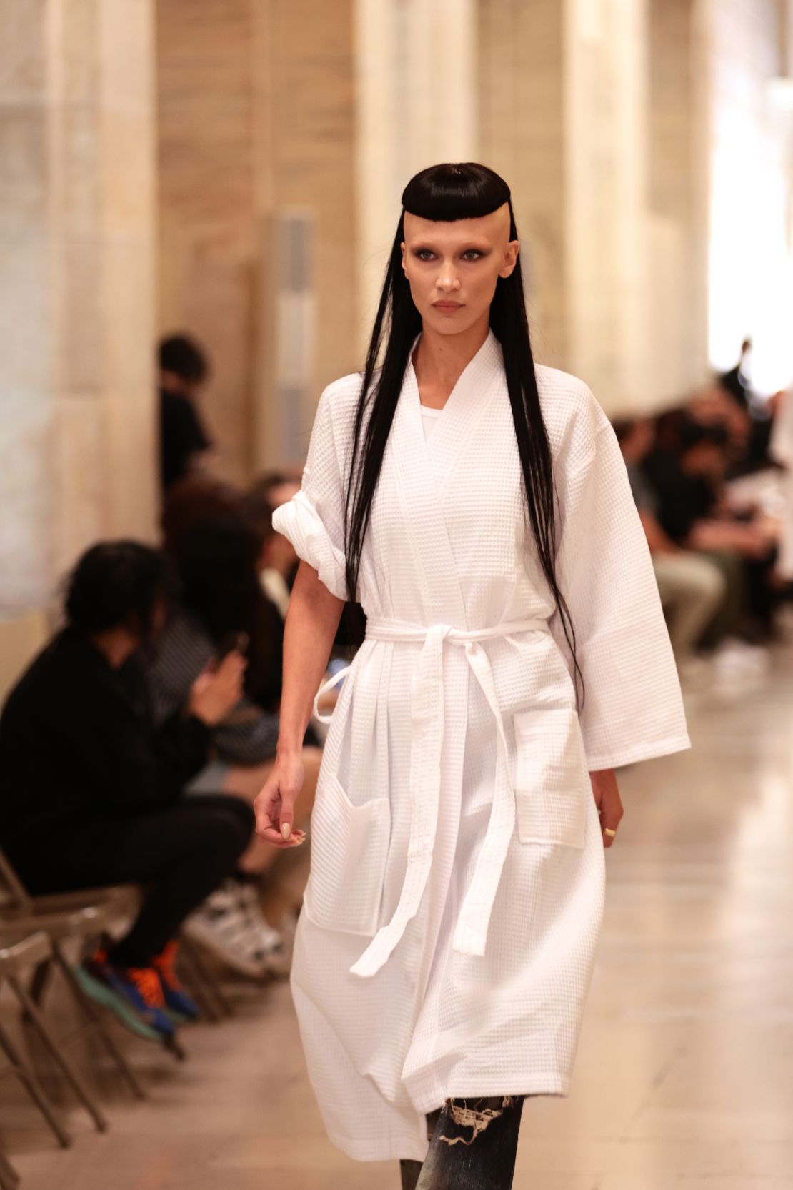 Gigi Hadid walks the runway during a rehearsal at the New York Public Library.