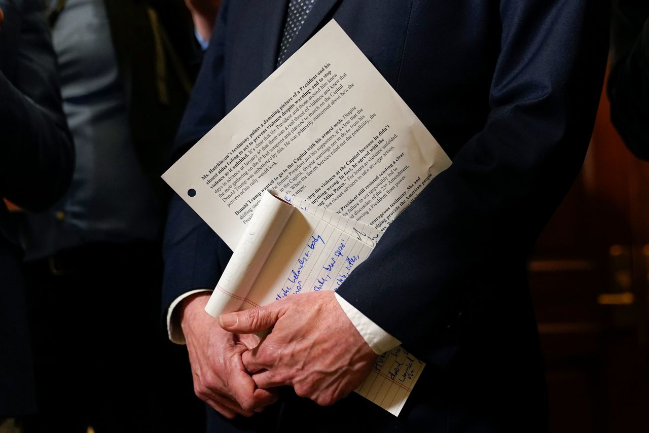 Raskin holds his notes while speaking to journalists on June 28.