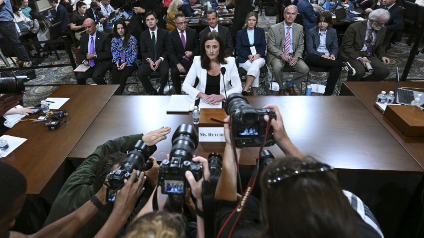 WASHINGTON, DC - JUNE 28: (EDITOR'S NOTE: Alternate crop) Cassidy Hutchinson, a top former aide to Trump White House Chief of Staff Mark Meadows, takes her seat following a break as she testifies during the sixth hearing by the House Select Committee to Investigate the January 6th Attack on the U.S. Capitol in the Cannon House Office Building on June 28, 2022 in Washington, DC. The bipartisan committee, which has been gathering evidence for almost a year related to the January 6 attack at the U.S. Capitol, is presenting its findings in a series of televised hearings. On January 6, 2021, supporters of former President Donald Trump attacked the U.S. Capitol Building during an attempt to disrupt a congressional vote to confirm the electoral college win for President Joe Biden. (Photo by Brandon Bell/Getty Images)