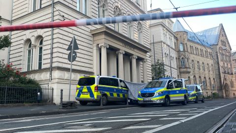 Police in Bonn, Germany secure the area around a district court, where a severed human head was found on June 28, 2022. 