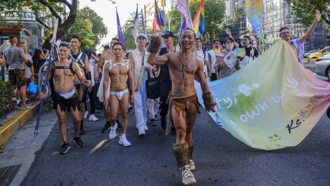 People take to the streets of Taipei for the city's annual Pride festival in 2020. The island has a progressive reputation in Asia, buoyed by the legalization of same-sex marriage in 2019.