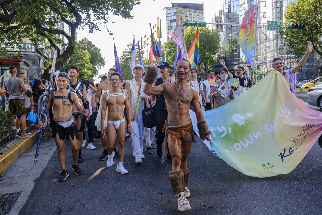People take to the streets of Taipei during the city's annual Pride festival in 2020. The island has a progressive reputation in Asia, boosted by its legalization of same-sex marriage in 2019.