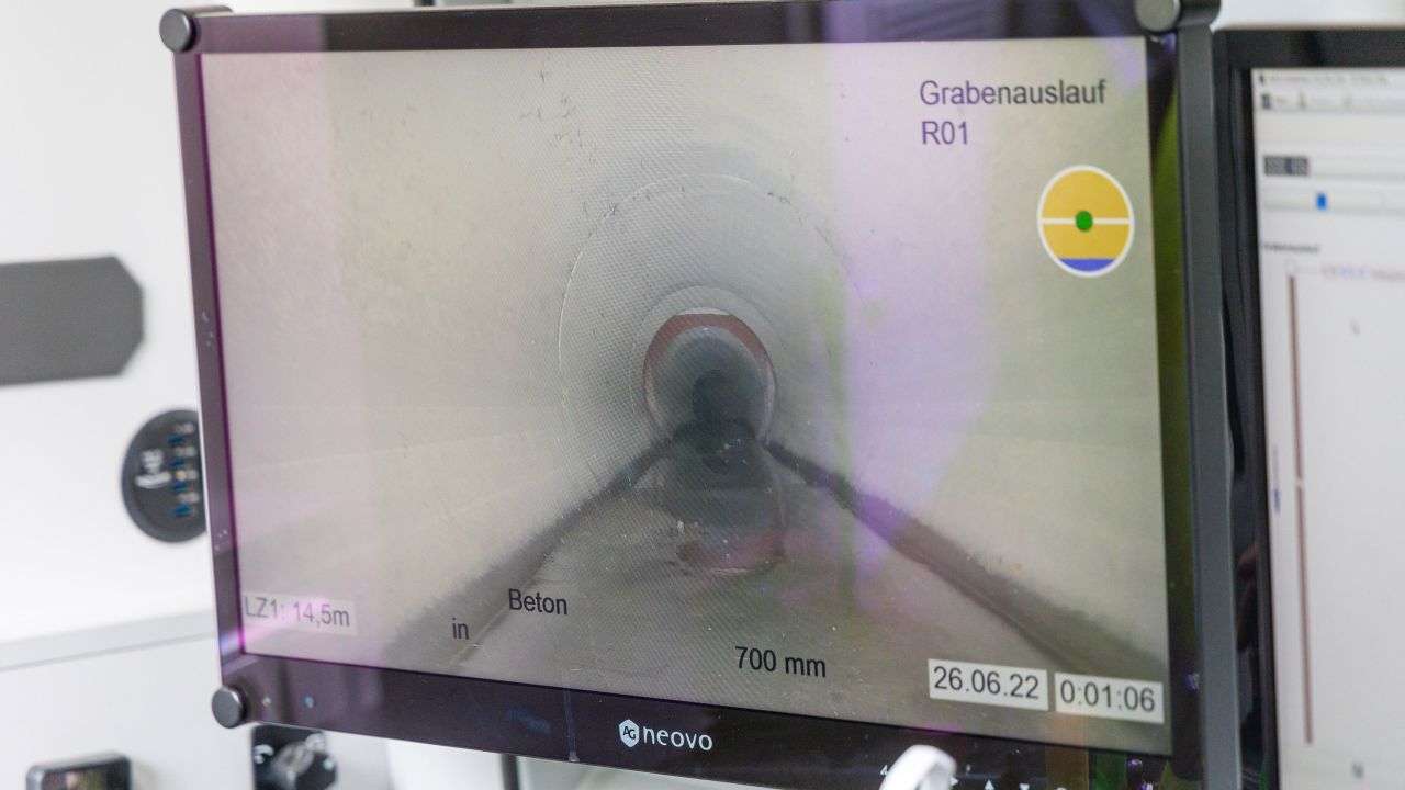 The movement of a robot through the sewer system can be seen on a monitor. 