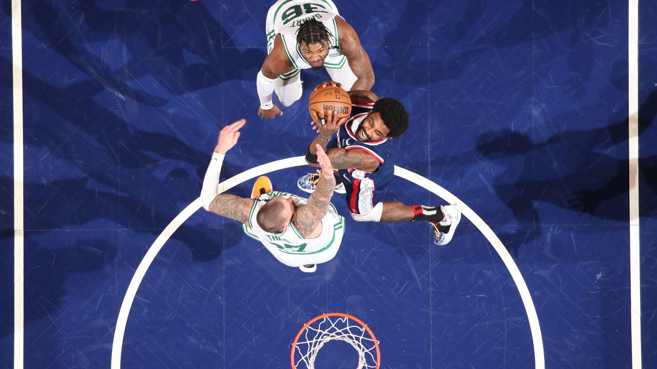 Irving drives to the basket against the Celtics during the 2022 NBA Playoffs.