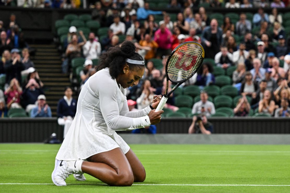 Williams fist pumps during her first-round defeat against Harmony Tan at Wimbledon. 