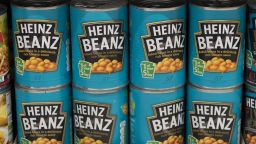 Tins of Heinz baked beans stacked on a shelf in a supermarket on October 13, 2017 in Cardiff, United Kingdom. 