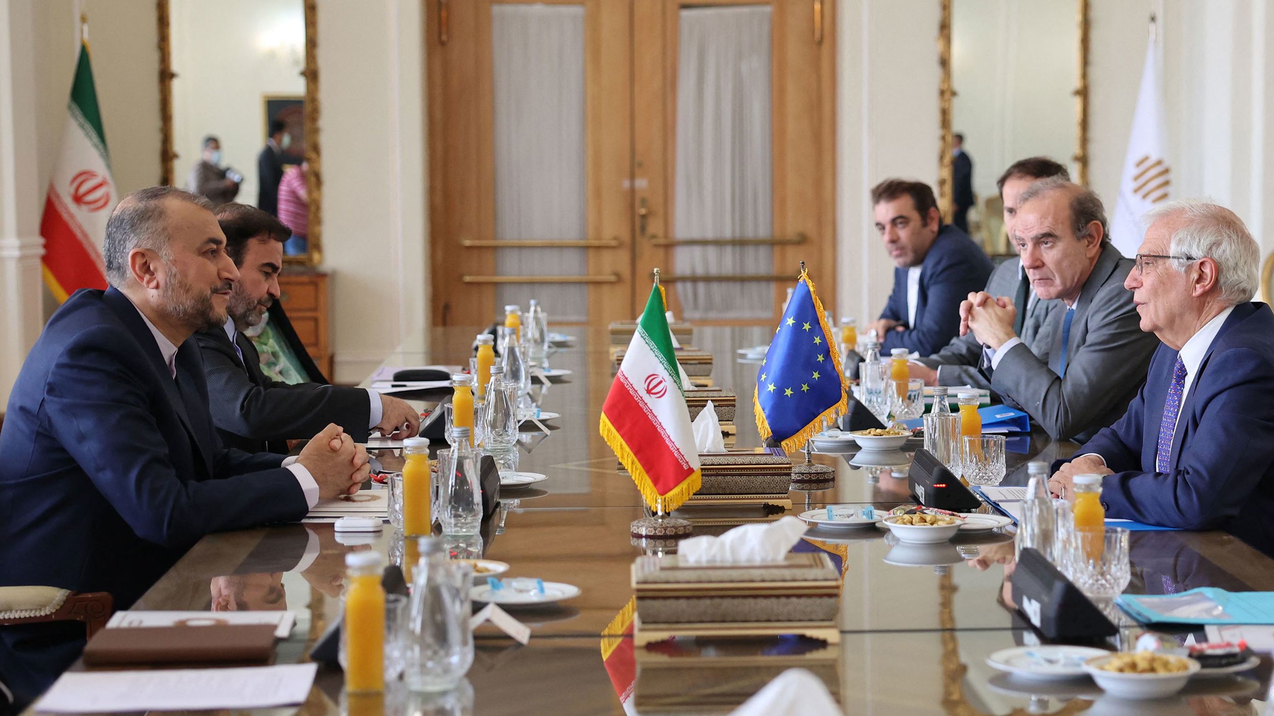 Iran's Foreign Minister Hossein Amir-Abdollahian (L) meets Josep Borell, the High Representative of the European Union for Foreign Affairs and Security Policy (R), and Deputy Secretary General of the European External Action Service Enrique Mora (2nd-R) at the foreign ministry headquarters in Iran's capital Tehran on June 25.