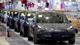 FILE PHOTO: FILE PHOTO: Tesla China-made Model 3 vehicles are seen during a delivery event at the carmaker's factory in Shanghai, China January 7, 2020. REUTERS/Aly Song/File Photo/File Photo/File Photo