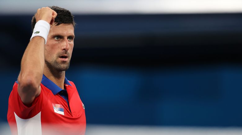 Novak Djokovic of Team Serbia celebrates after match point during his Men's Singles Second Round match against Jan-Lennard Struff of Team Germany on day three of the Tokyo 2020 Olympic Games at Ariake Tennis Park on July 26, 2021 in Tokyo, Japan.