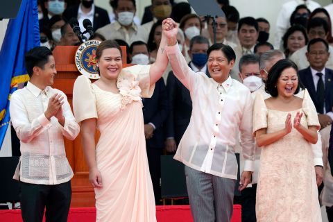 Philippines President Ferdinand Marcos Jr., second from right, and Vice President Sara Duterte, second from left, attend an inauguration ceremony in Manila, Philippines, on Thursday, June 30. Marcos Jr. won the election by a landslide in May, and <a href=