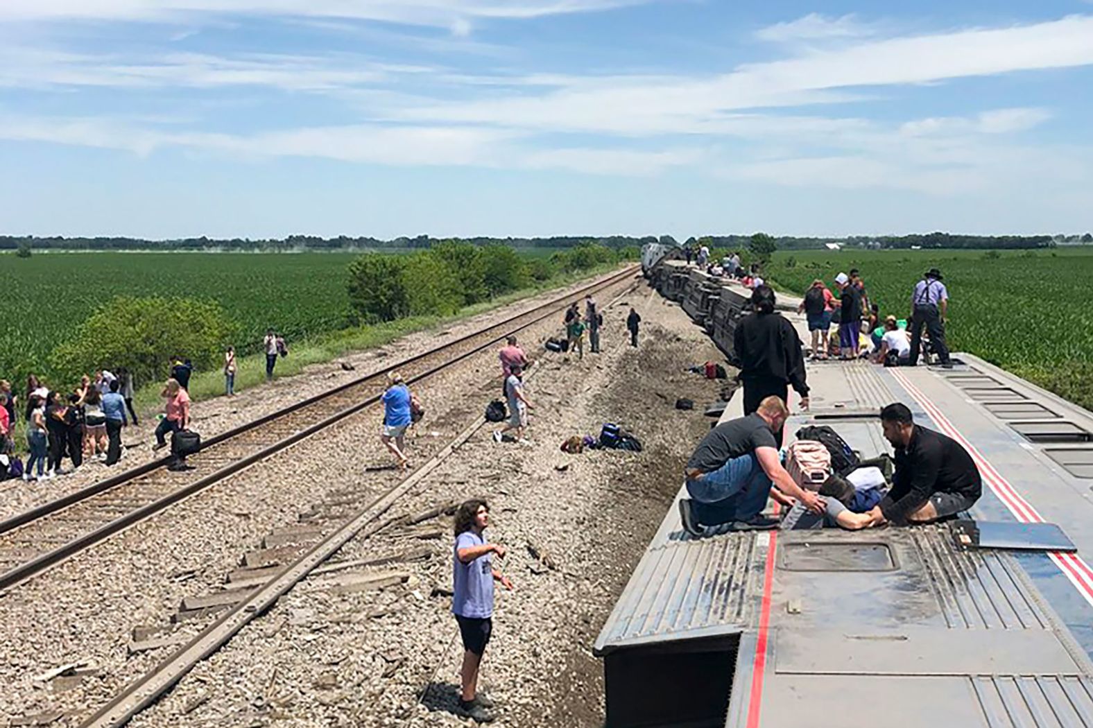 An Amtrak train lies on its side after <a href="https://www.cnn.com/2022/06/27/us/missouri-amtrak-train-derailment/index.html" target="_blank">derailing </a>near Mendon, Missouri, on Monday, June 27. Three people died and at least 50 were injured after the train hit a dump truck at an uncontrolled intersection.