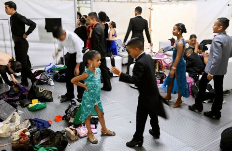 Tango dancers wait backstage during an event at the Medellín Tango Festival in Medellín, Colombia, on Sunday, June 26.
