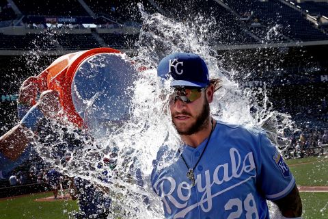 Kyle Isbel, a center fielder with Major League Baseball's Kansas City Royals, is doused by teammates after a win over Texas on Wednesday, June 29.
