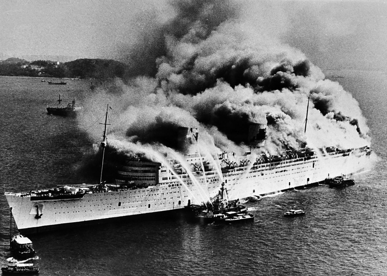 A fire broke out on the former RMS Queen Elizabeth vessel under unexplained circumstances on January 9, 1972. It sank in Hong Kong Harbor despite a massive firefighting effort over two days.