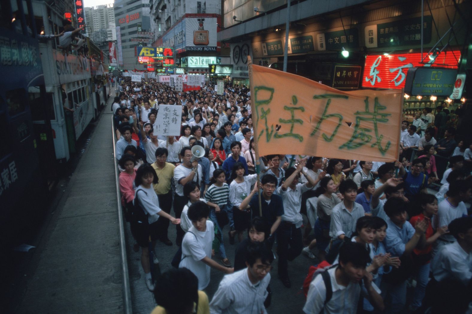 Pro-democracy demonstrators protest in Victoria Park to show solidarity with victims of the Tiananmen Square massacre in 1989.