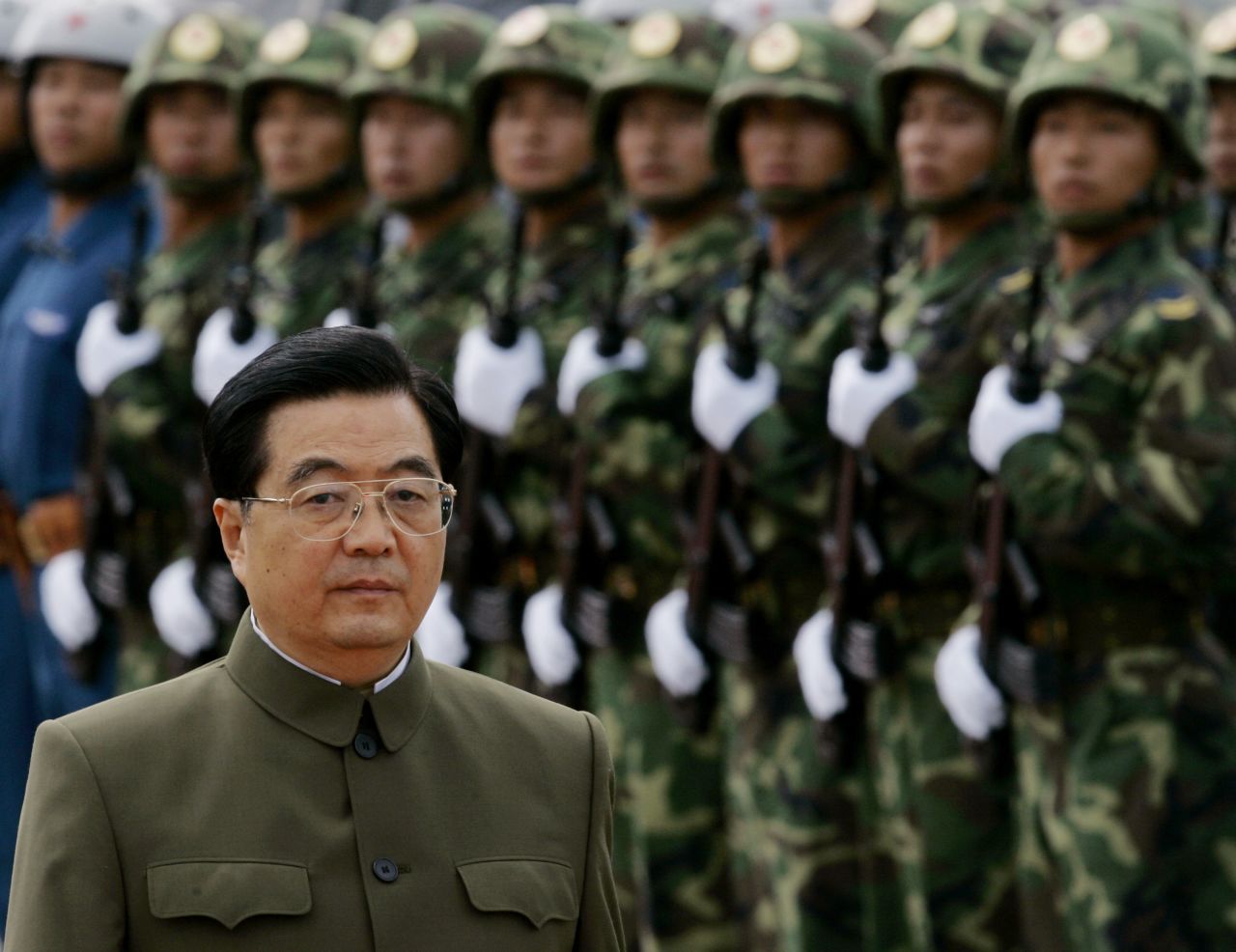 Chinese leader Hu Jintao inspects troops stationed in Hong Kong in 2007. Hu was on a weekend visit to Hong Kong to oversee the 10th anniversary of the city's handover to Chinese rule. 