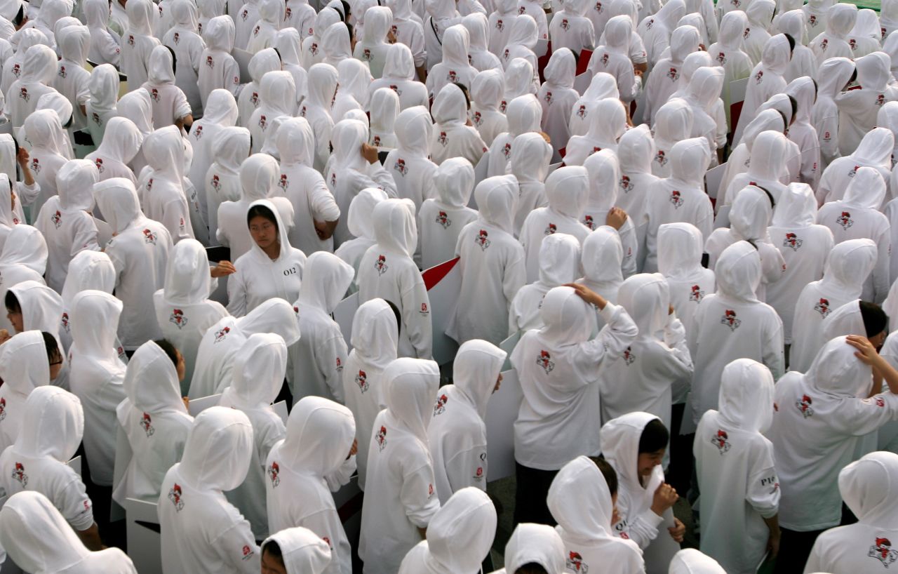 Young volunteers gather in Hong Kong's Kowloon Park Piazza in 2007 for an inauguration ceremony to mark the 500-day countdown to the Beijing Summer Olympic Games.
