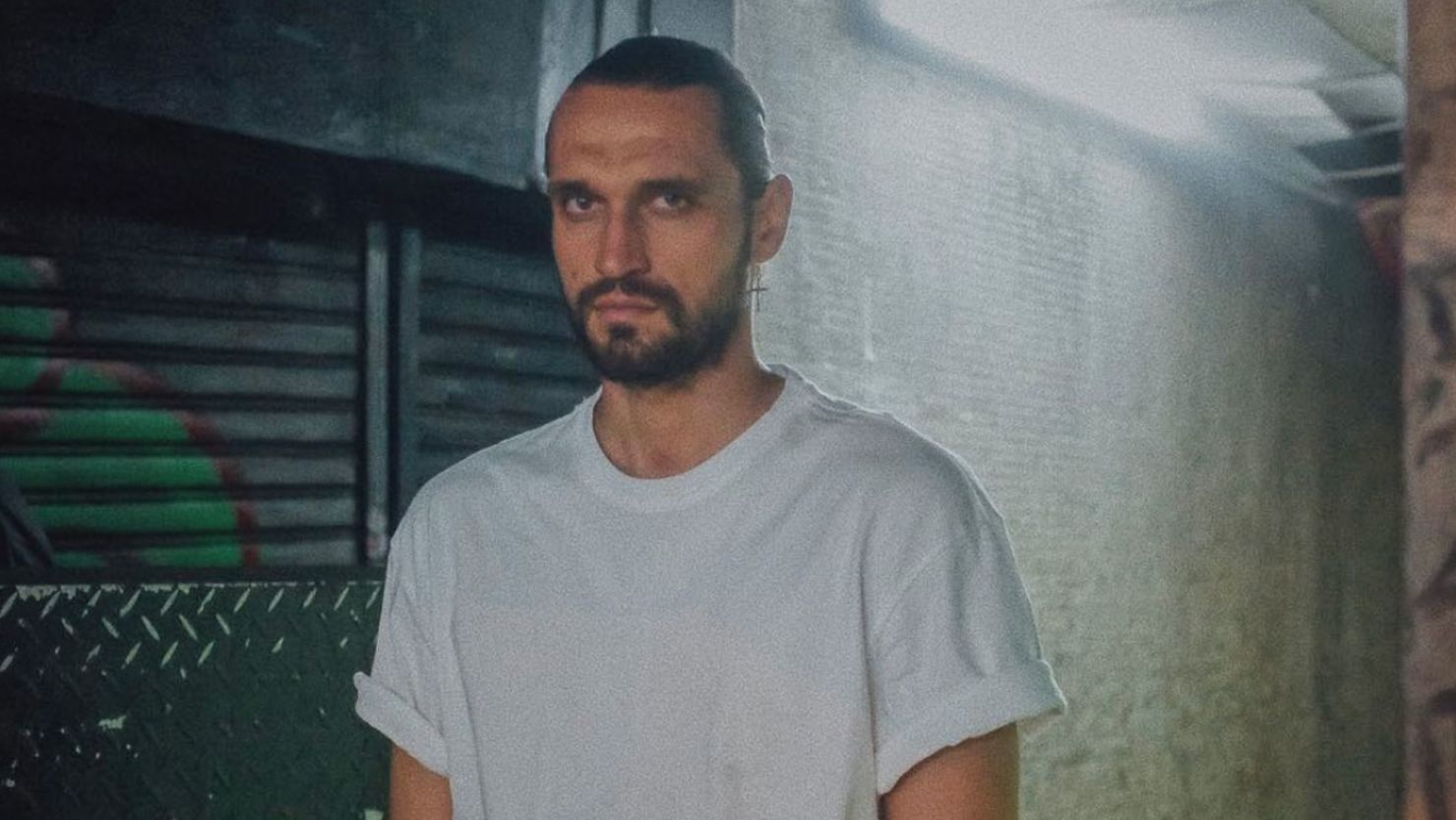 Ukrainian footballer Aleks Shliakotin in the streets of Hong Kong in 2021.