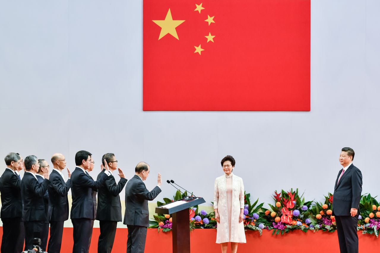 Carrie Lam, Hong Kong's new chief executive, and her new cabinet are sworn in by Chinese President Xi Jinping during an inauguration ceremony in Hong Kong in 2017.