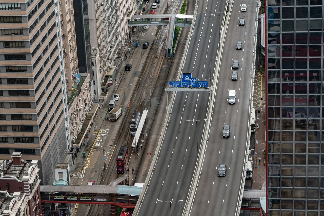 The convoy of Chinese President Xi Jinping makes it way down a street as he arrives in Hong Kong for the 25th handover anniversary on June 30, 2022.