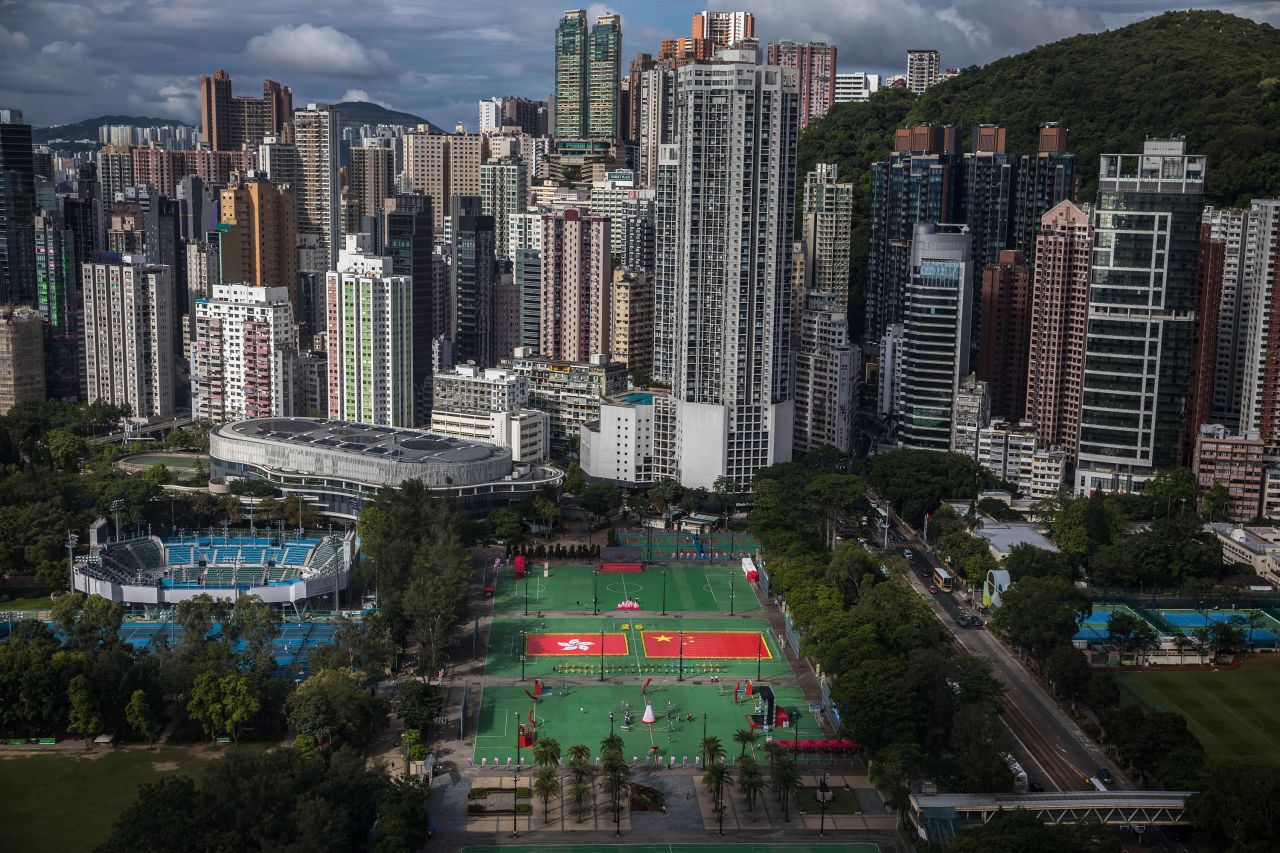 The flags of Hong Kong and China are displayed at Victoria Park ahead of the 25th handover anniversary.