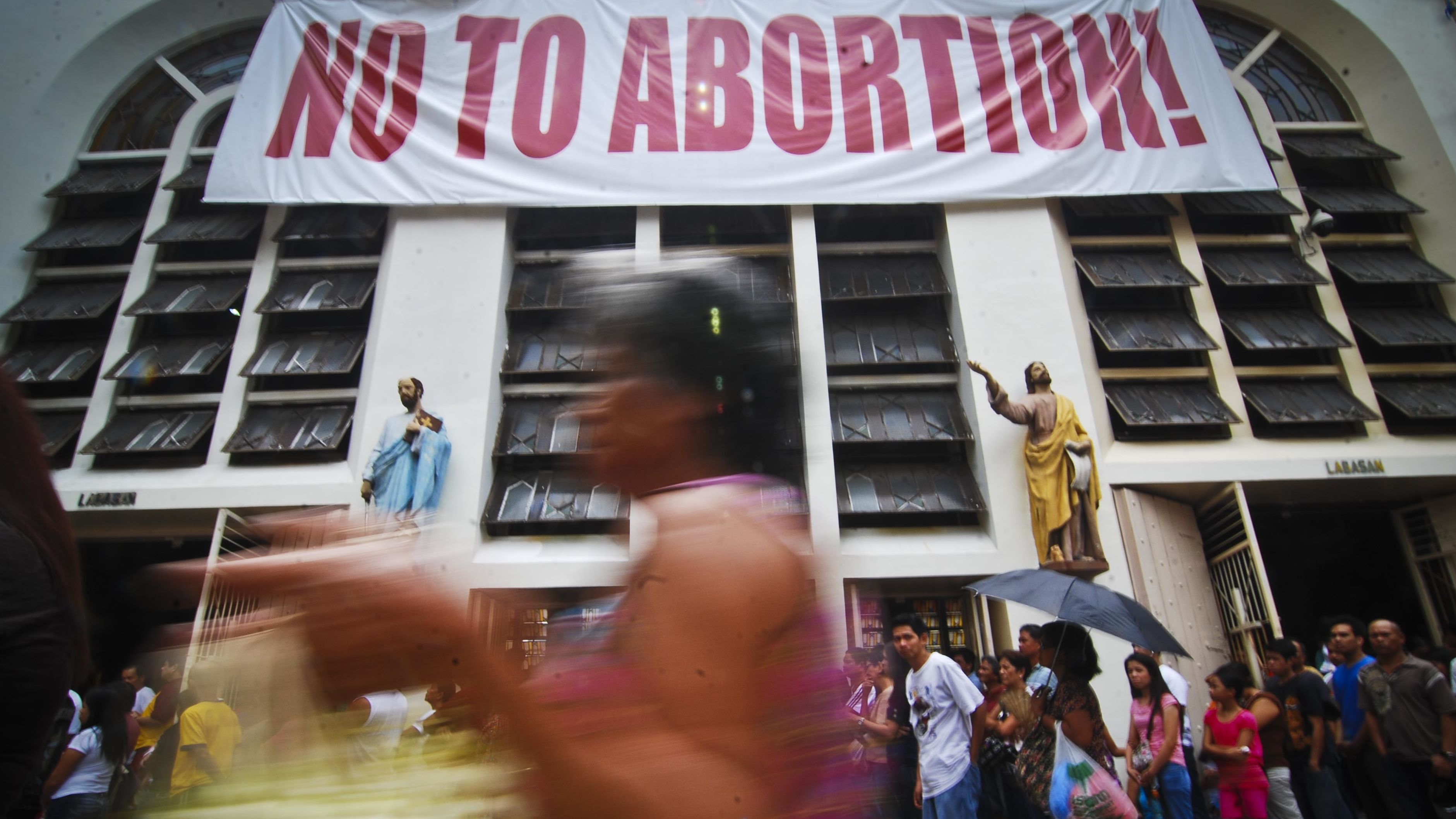A placard is displayed during an anti-abortion rally in Manila.