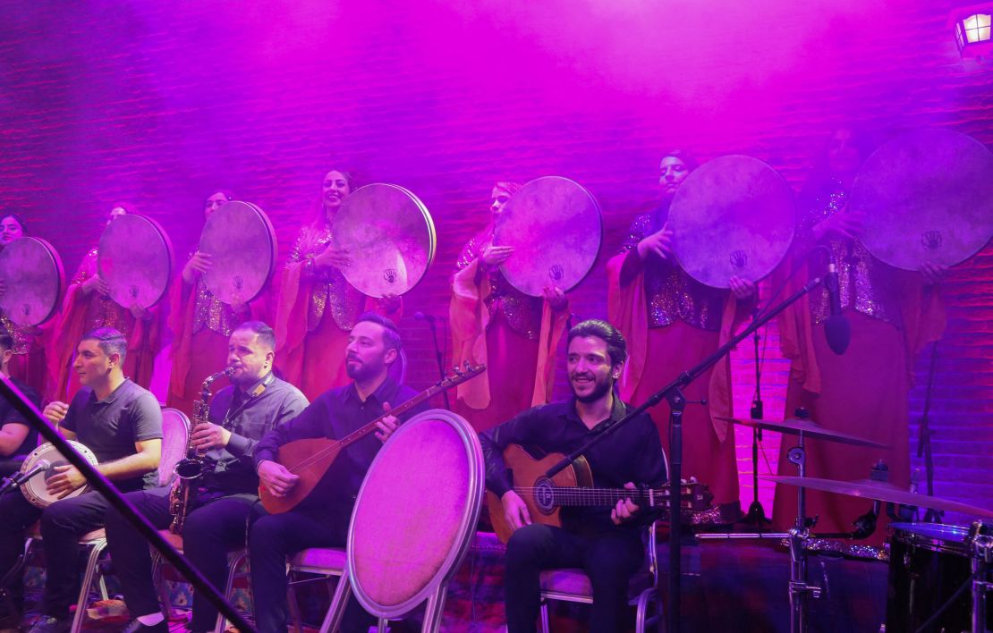 Iraqi Kurdish musicians perform at a concert alongside Iran's Sarmast musical group at the Erbil citadel in Erbil, the capital of the Kurdish autonomous region in northern Iraq, on June 30. 