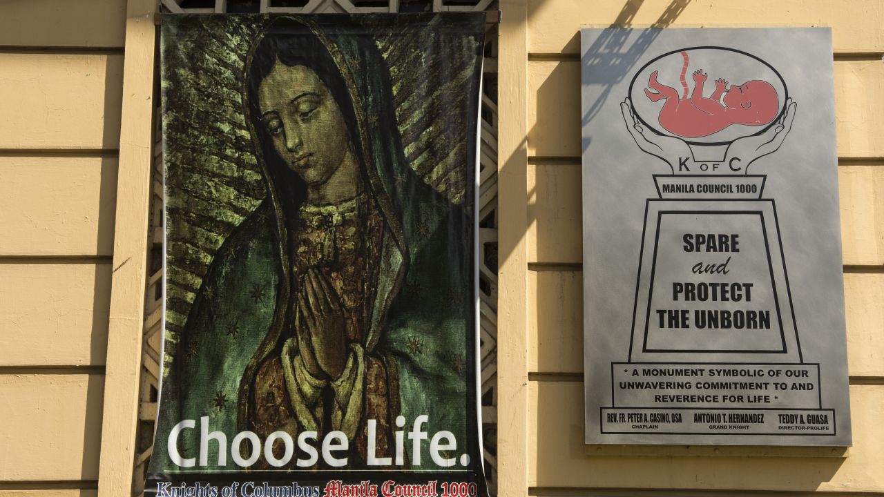 An anti-abortion poster on the sides of a building in Manila.