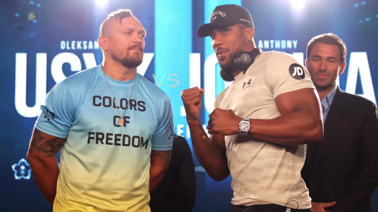 Anthony Joshua and Oleksandr Usyk face off during a press conference in London.