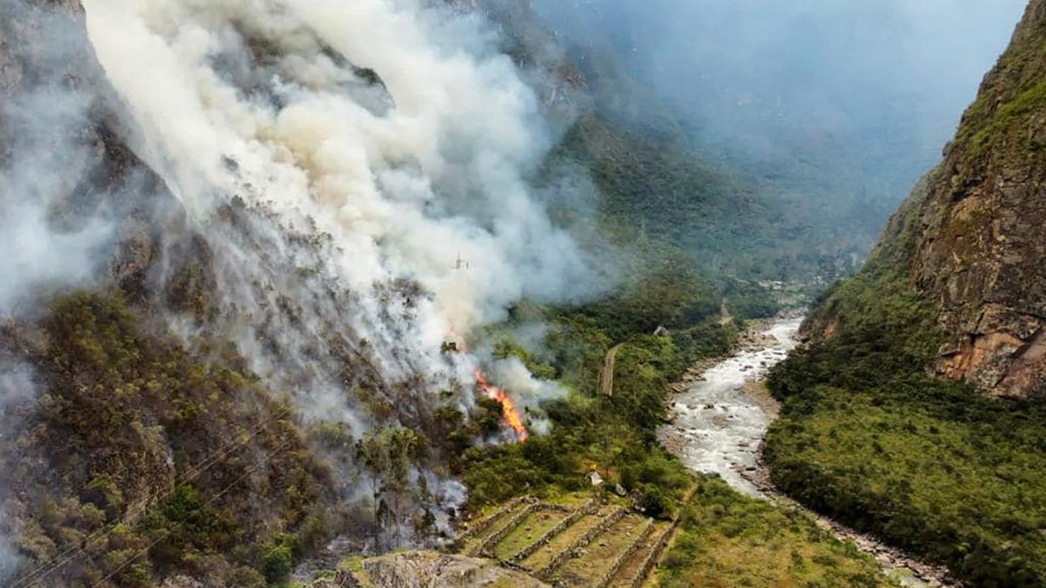 A forest fire burns in Machu Picchu, Peru, in this image released on June 29, 2022. Ministry of Culture of Peru/Handout via REUTERS    THIS IMAGE HAS BEEN SUPPLIED BY A THIRD PARTY. NO RESALES. NO ARCHIVES. MANDATORY CREDIT.