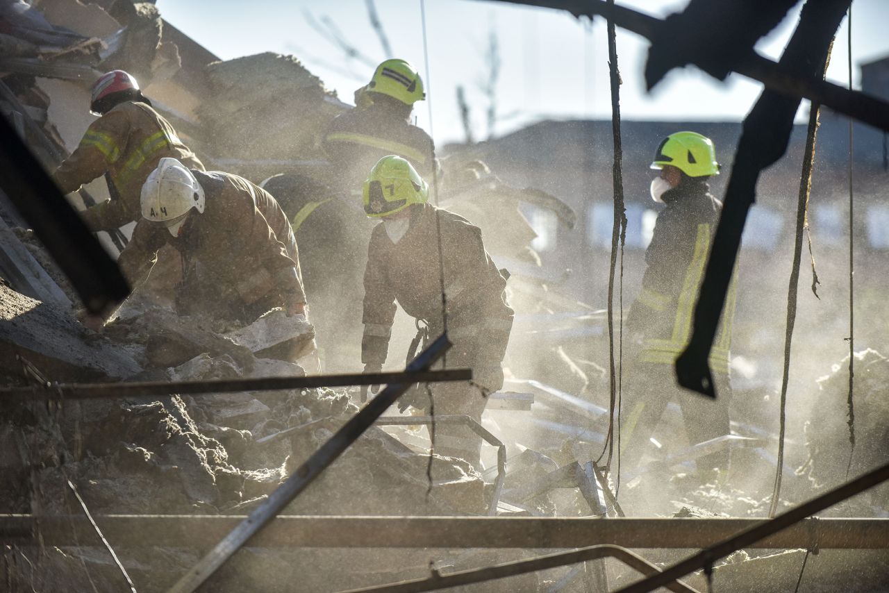 Firefighters clear rubble at the Amstor shopping mall in Kremenchuk, Poltava Oblast, Ukraine, on June 28.